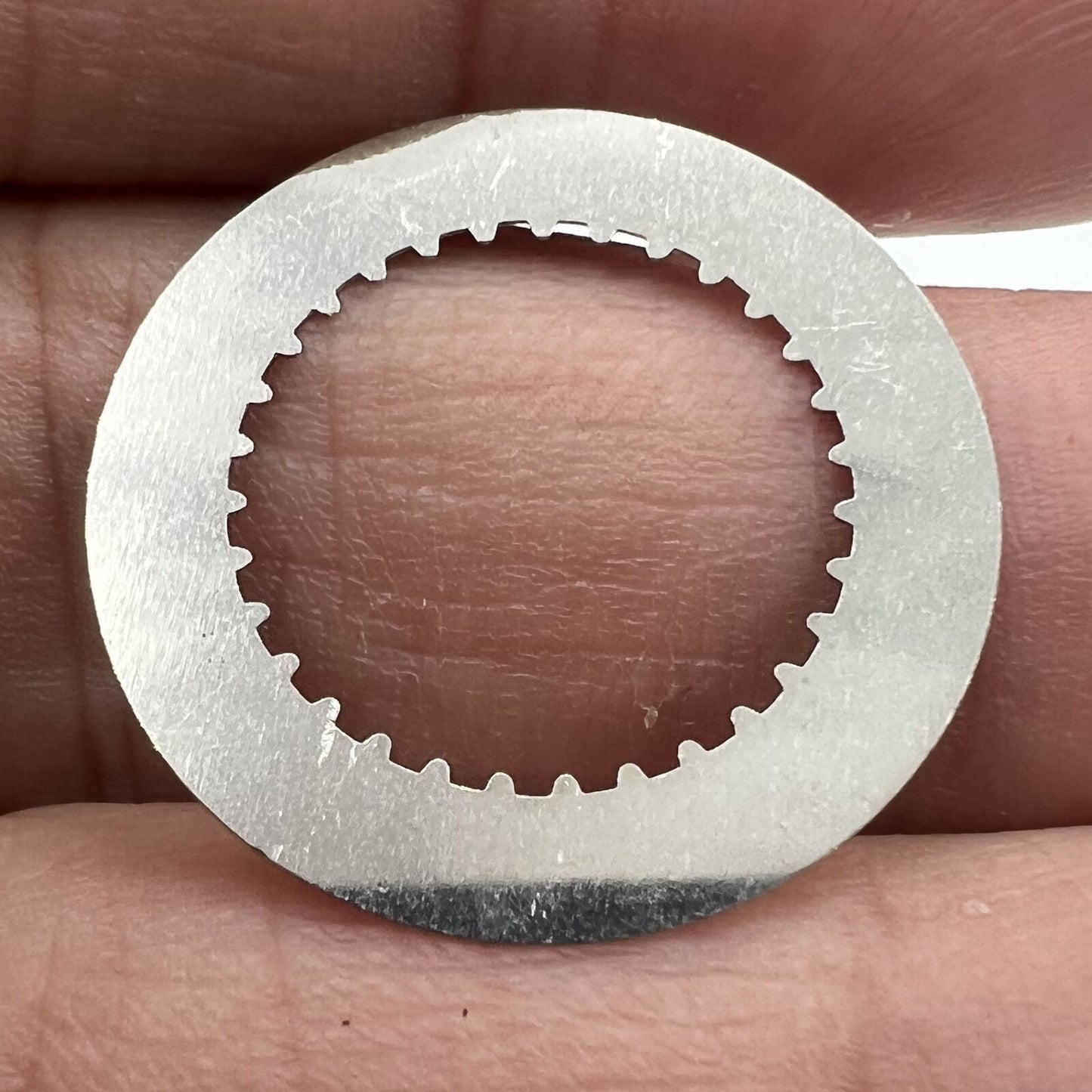 White date disk wheel for RLX 3135 watch movement, precise replacement part for Rolex timepieces.