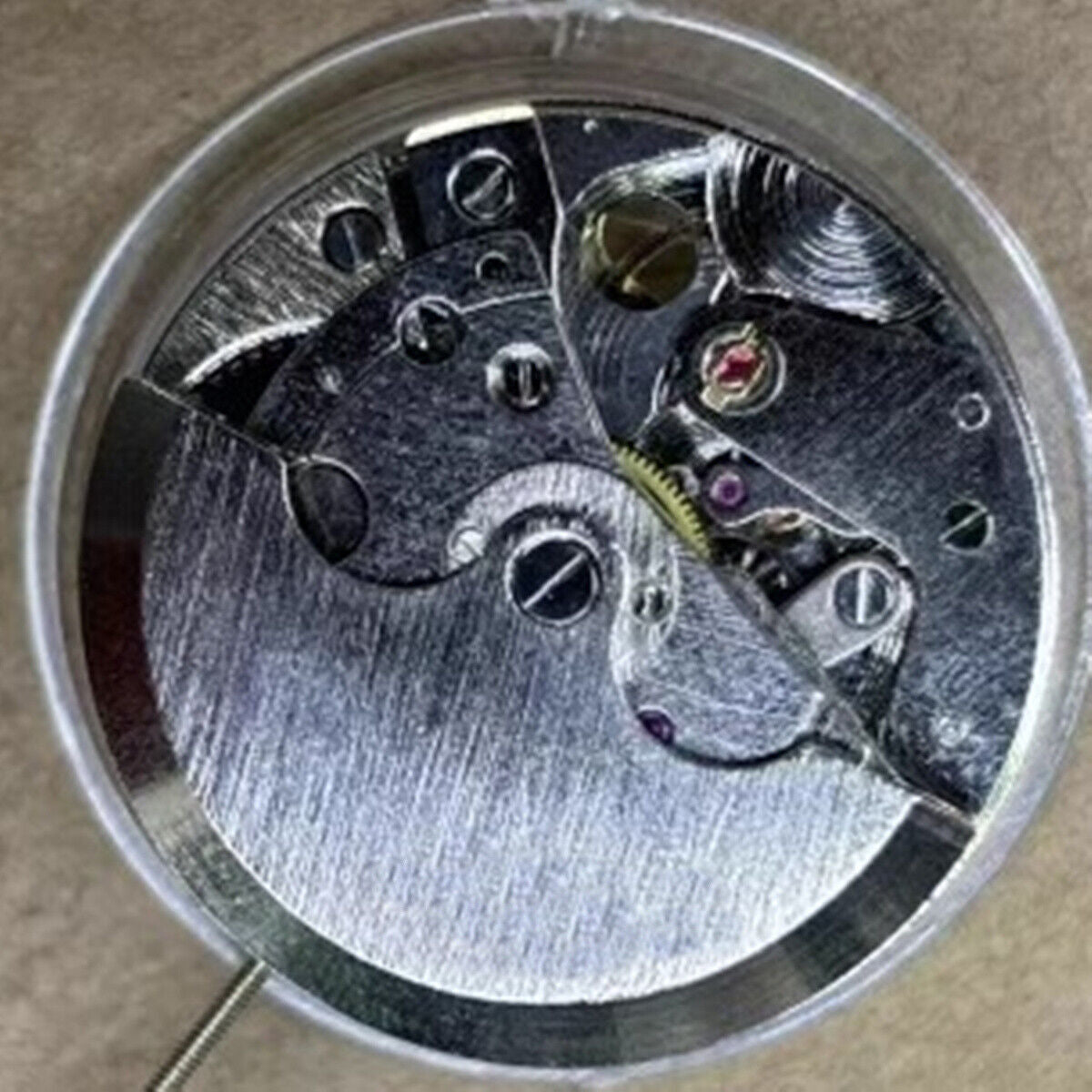 China Made New 7120 automatic watch with mechanical movement, 24-hour display at 3, and moon phase at 6