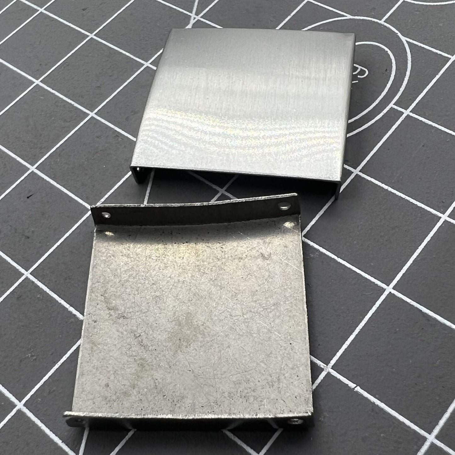 Silver 3-fold watch strap buckle extender, 18 pieces in 9 sizes for bracelet adjustments.