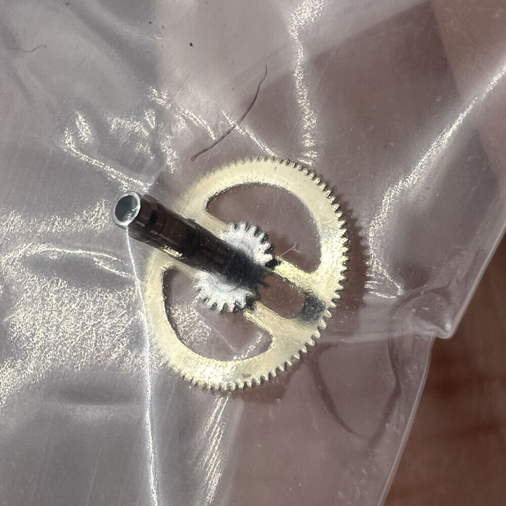 Swiss Cannon pinion with driving wheel for ETA C01.211, precision watch part by Swiss Cannon.