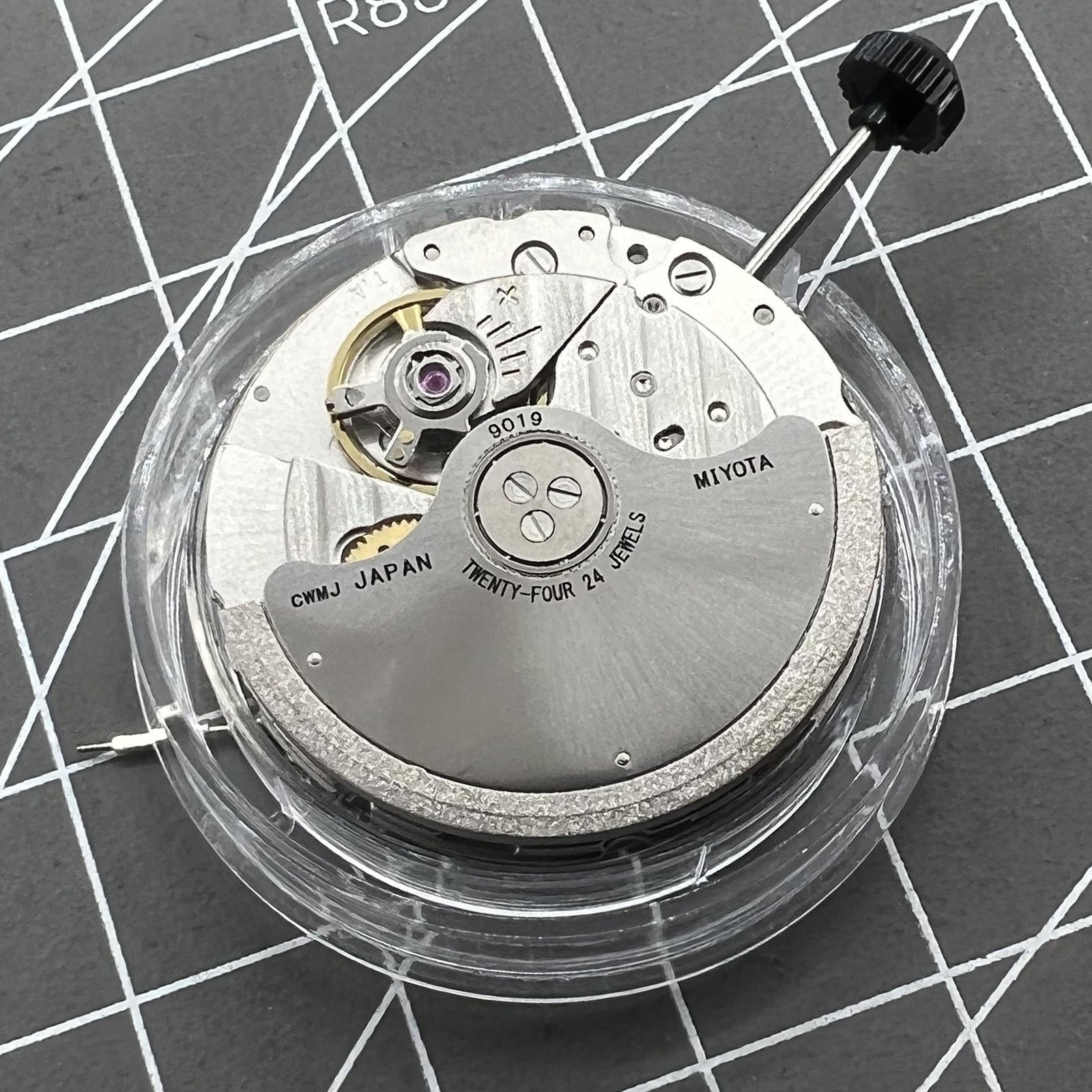 Miyota 9019 automatic watch movement with mechanical date display at 6 o'clock, precision Japanese brand.