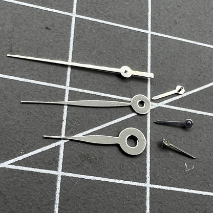 Silver 14mm arrow-shaped watch hands, no lume, compatible with Miyota 0S11 for precise timing.