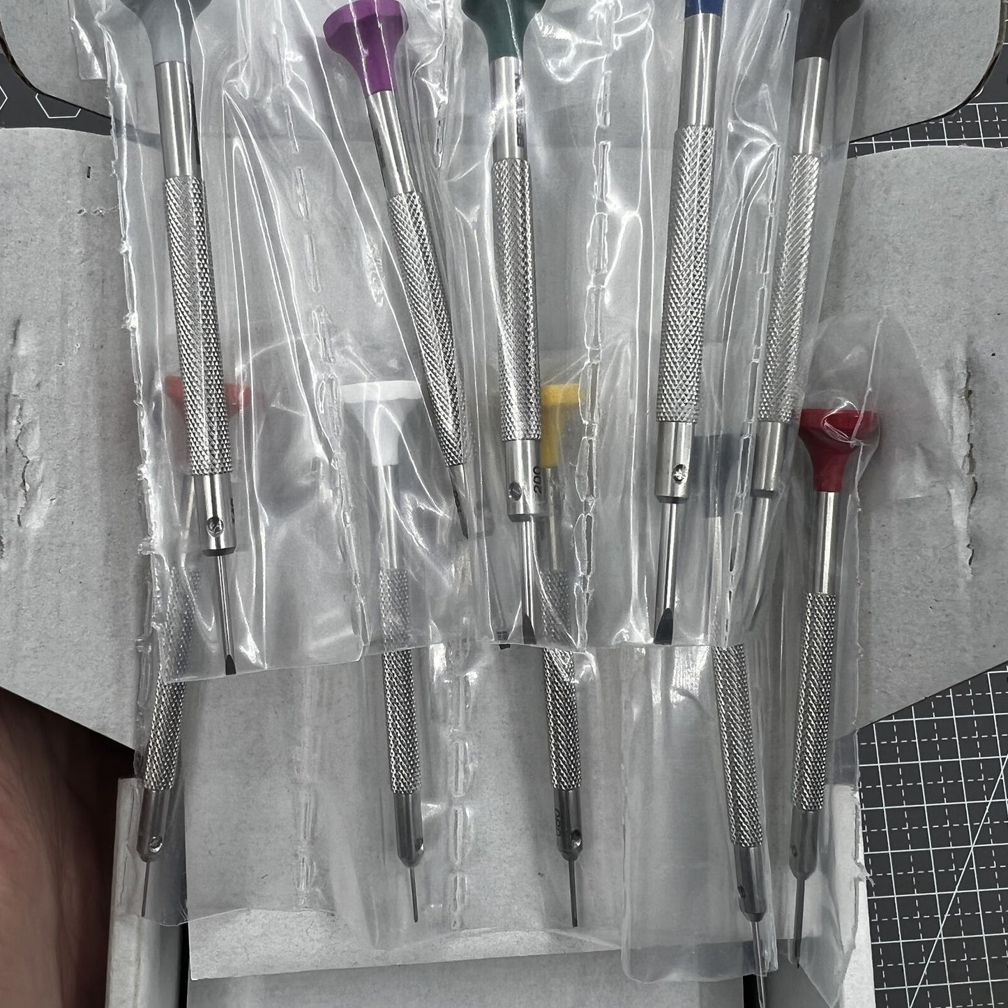 Swiss Bergeon 30081-S10 ergonomic screwdriver set with rotating stand for precise watch accessory repairs.