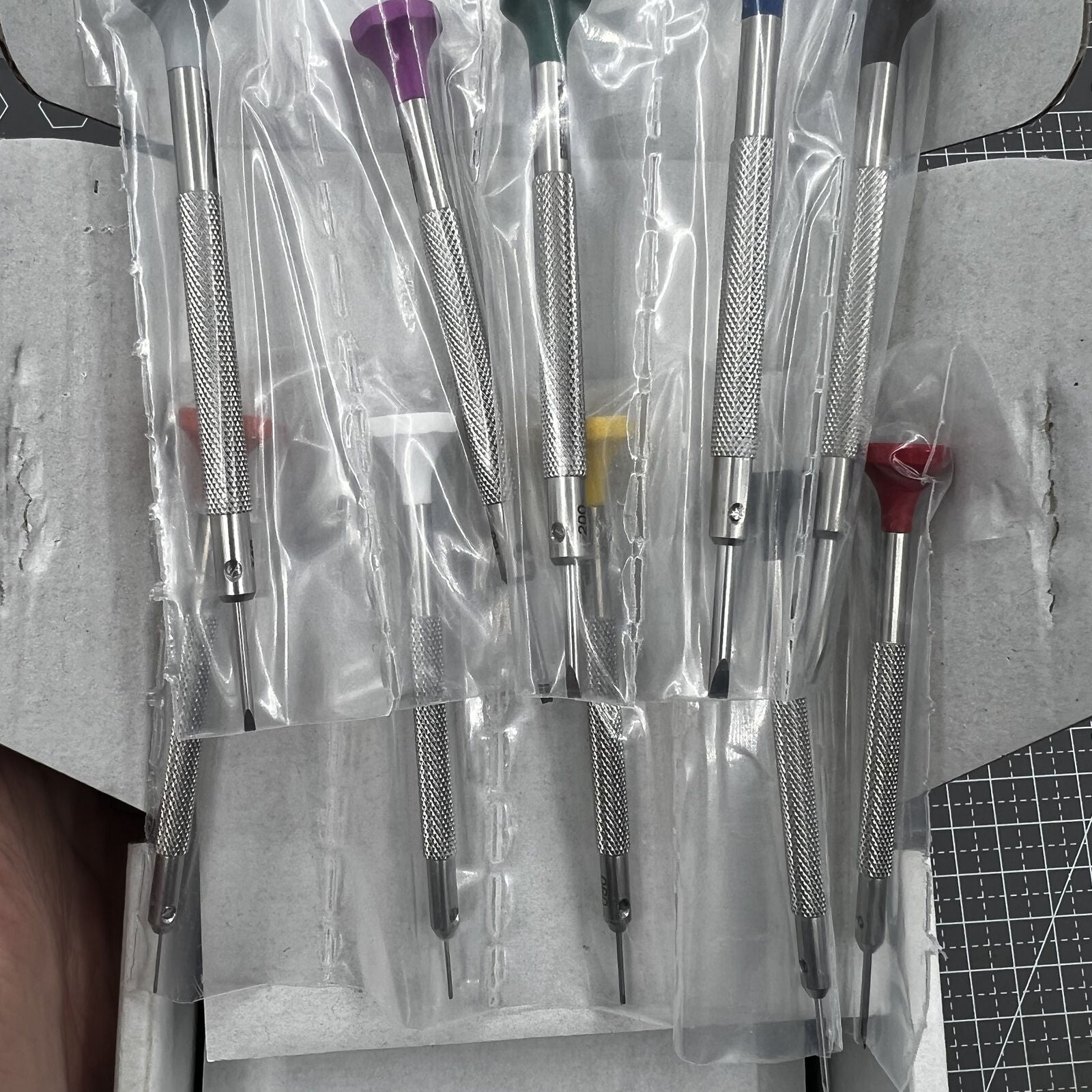 Swiss Bergeon 30081-S10 ergonomic screwdriver set with rotating stand for precise watch accessory repairs.