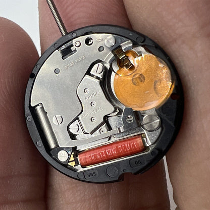 Ronda 585 Swiss quartz watch movement with date display at 6 o'clock, standard height design.