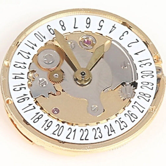 SHANGHAI 2824 watch accessory with golden automatic mechanical movement and date display at 6 o'clock