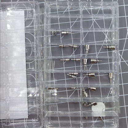 Classic stainless steel chronograph button set with 26 screw-in pushers for precise watch repair and customization.