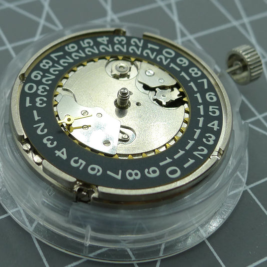 Black Seagull ST2555 automatic watch movement with second hand at 9H, perlage finish, and big date display.
