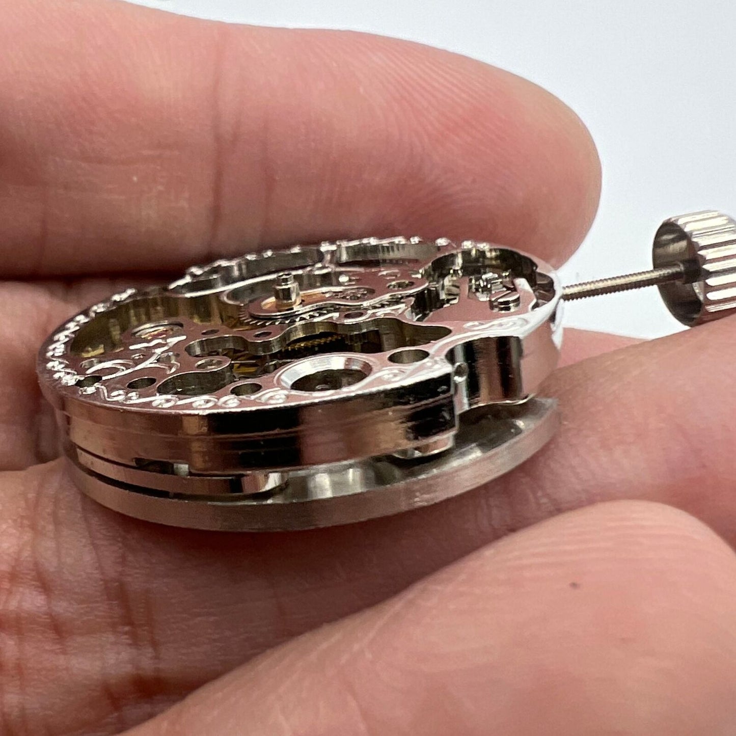 7120 Silver Hollow Extra Large watch displaying intricate automatic mechanical movement details.