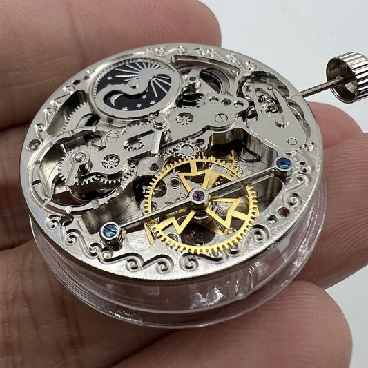 Double Mainspring mechanical watch with hollow design and dual time zone by Double Mainspring.