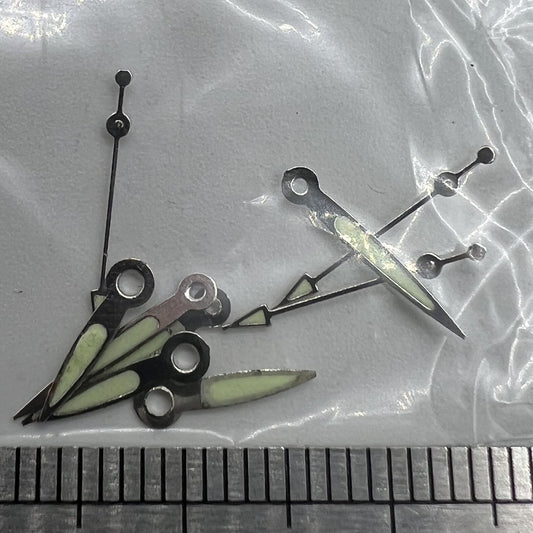 Luminous white-trimmed watch hands for Miyota 2035 quartz movement by P1-H4-C101, ideal for watch repairs.