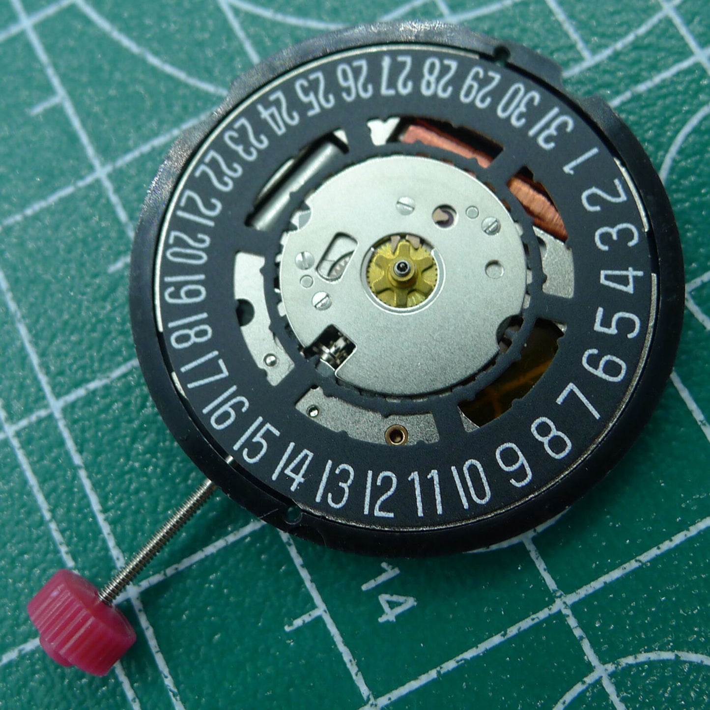 Swiss Part Ronda 715 quartz watch movement with black date wheel at 6 o'clock, replacement part.