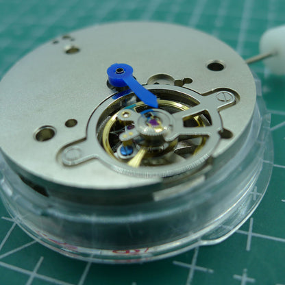 Wholesale Man Shanghai watch accessory highlighting automatic mechanical movement and hollow balance wheel at 6 o'clock for precise timekeeping.