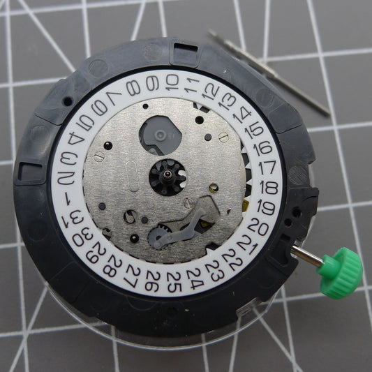 Japan Miyota OS20 quartz watch movement with date display at 4:30, precise and reliable for watchmakers.