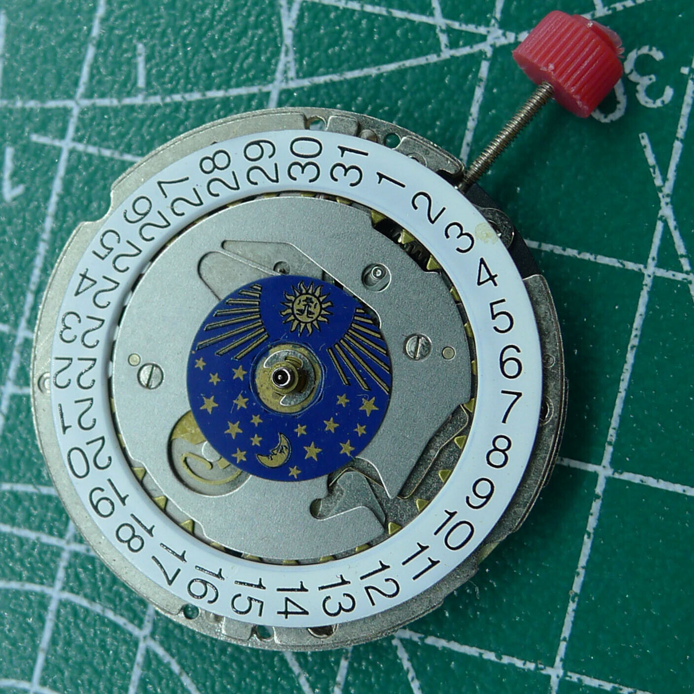 Wholesale ISA 1198 Quartz Movement watch with Swiss-made moon and star phase dial detail.