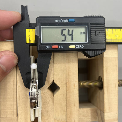 China Made 8205 automatic mechanical watch movement showing small seconds at 3, 6, and 9 o'clock positions for precise timekeeping.