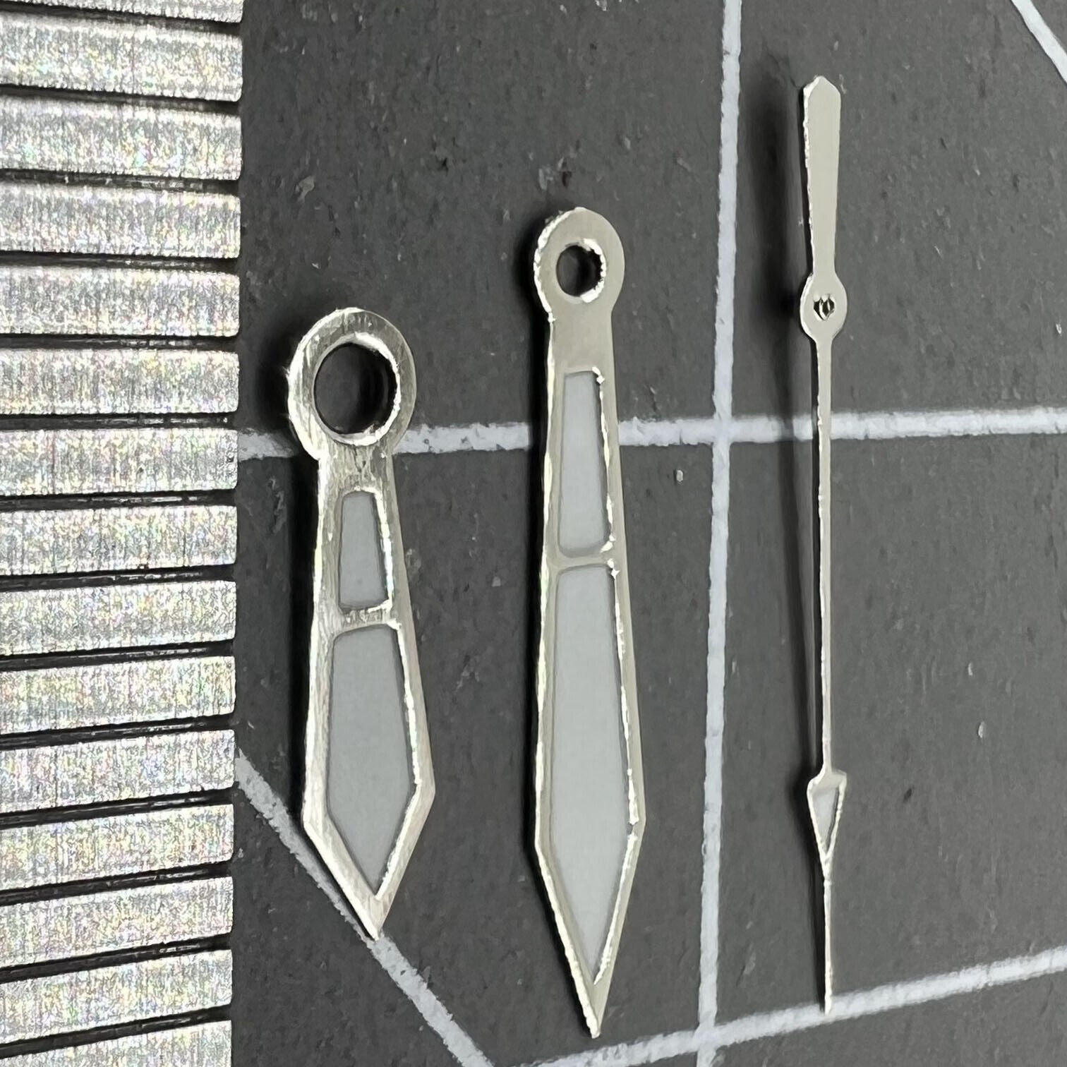 Silver arrow-shaped 12mm watch hands with trim, compatible with Miyota 2315 and 2035 movements, Hamiwatch brand.