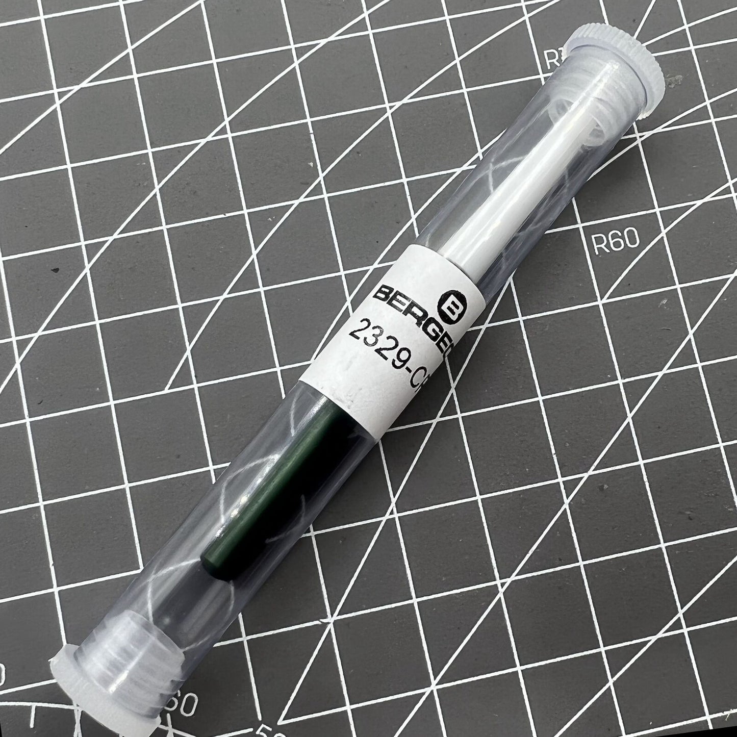 Bergeon 2329-CP watch oiler tool with stand for precise watch maintenance and lubrication.