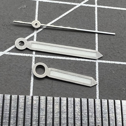 Set of 2 green luminous 17mm watch hands with silver trim for Miyota 2035, 2115, 2105, 2305 movements.