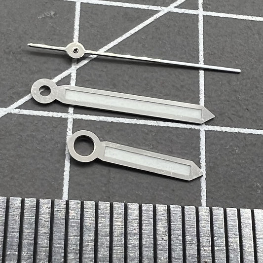 Set of 2 green luminous 17mm watch hands with silver trim for Miyota 2035, 2115, 2105, 2305 movements.