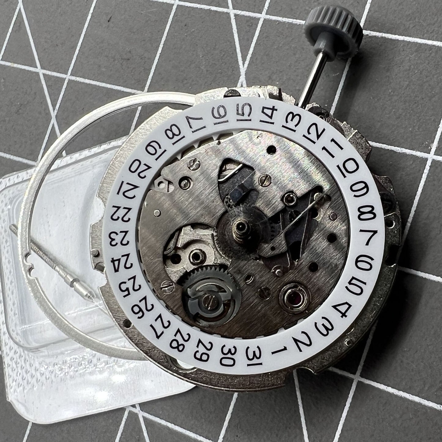 Miyota/Citizen 8200 series watch movement with single calendar date at 6 o'clock, precision timekeeping.