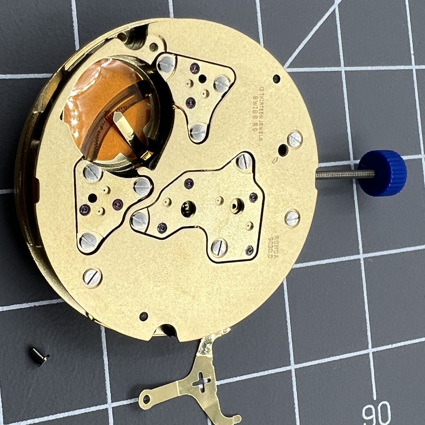 Ronda 5030D Swiss quartz watch movement with date window at 6 o'clock for precision timepieces.
