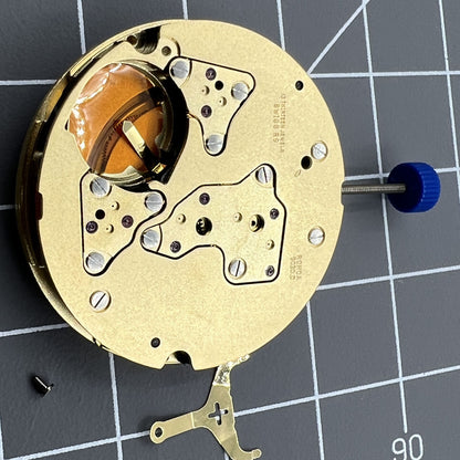 Ronda 5030D Swiss quartz watch movement with date window at 6 o'clock for precision timepieces.