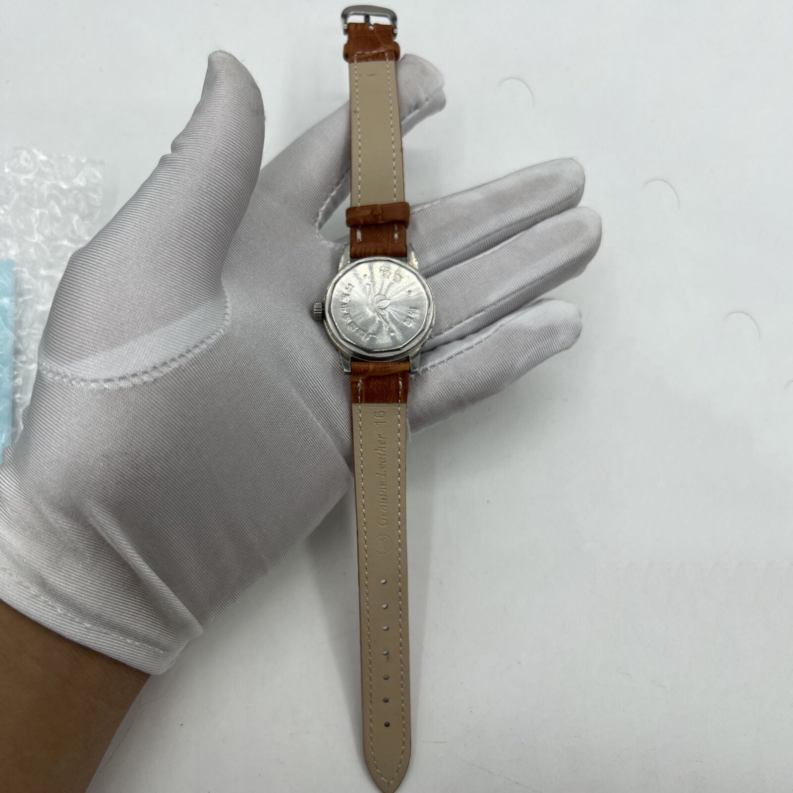 Chunlan 32mm light brown leather watch featuring silver dial and 17-jewel manual mechanical movement.