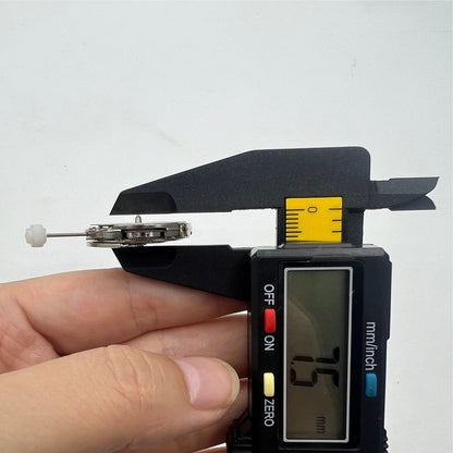 China Made 2813 mechanical watch movement displaying single calendar date at 3 o'clock, precise timekeeping mechanism.