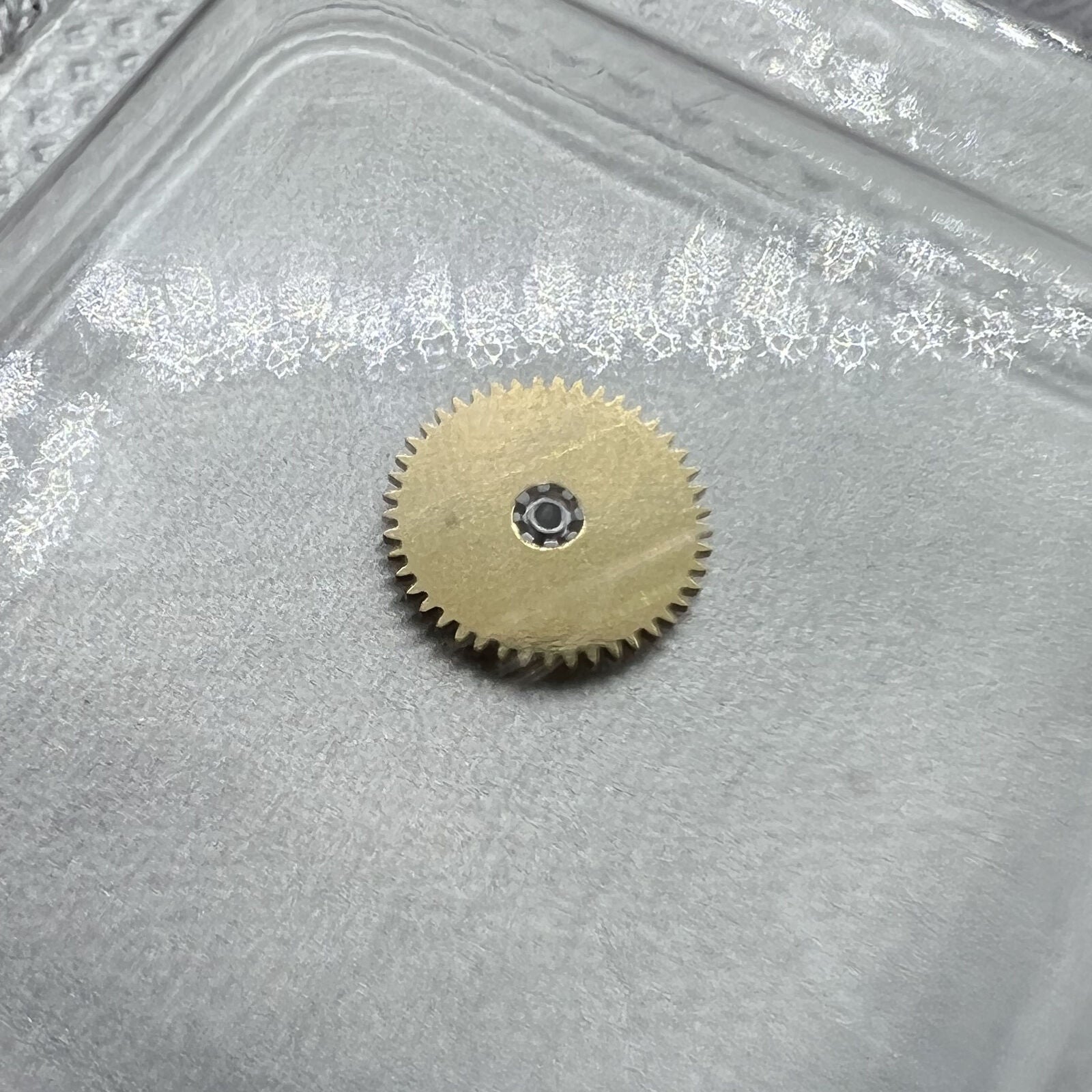 Ref.1482 Ratchet wheel by ETA, precision gear part for 2892 watch movement's driving mechanism.