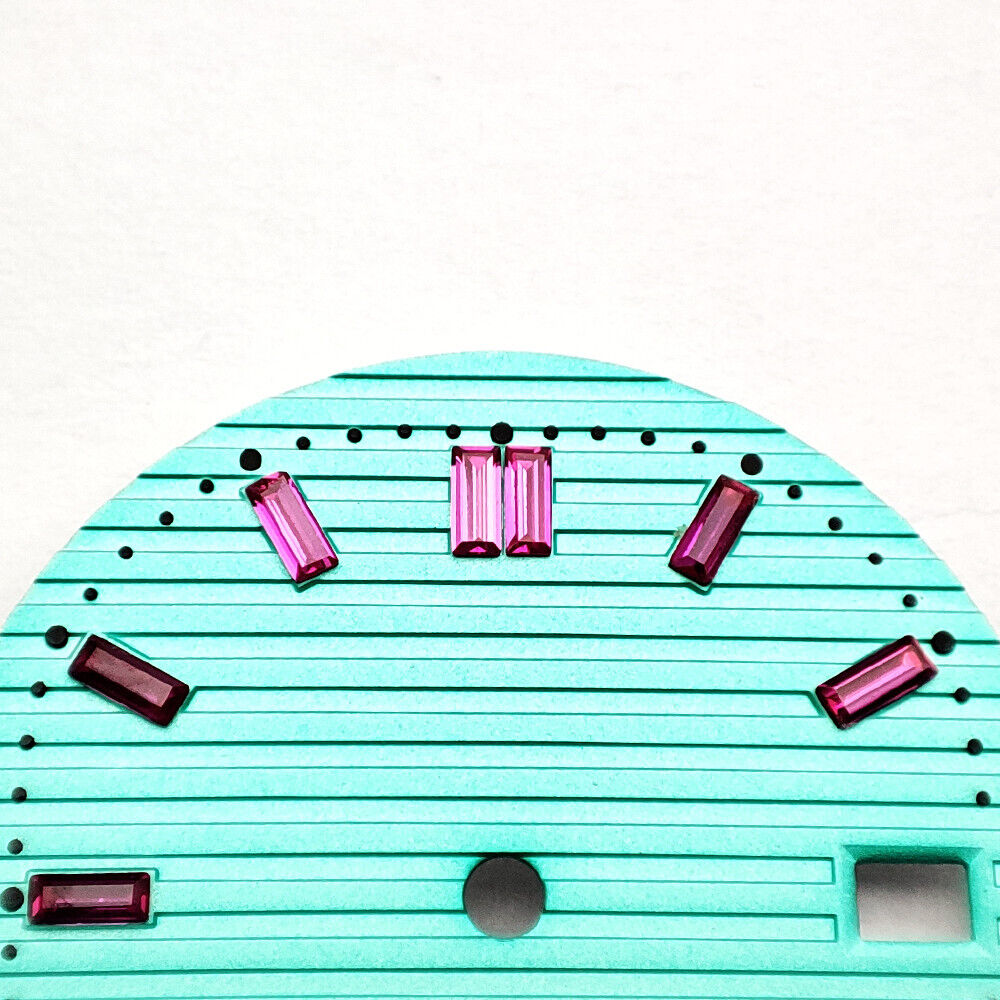 Pink imitation gemstone accent on 29.8mm light green watch dial for NH35 movement.