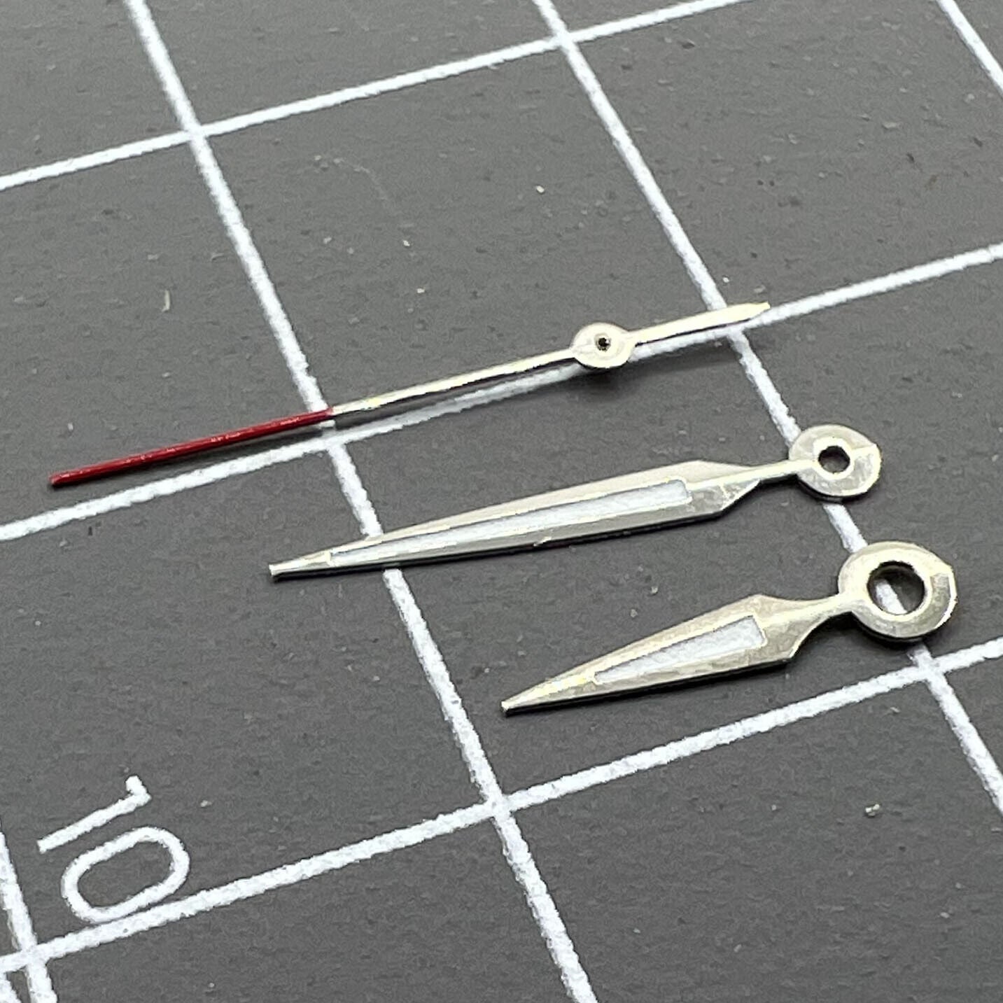 Luminous arrow-shaped watch hands by Miyota, perfect for enhancing visibility on 2035 quartz movements.