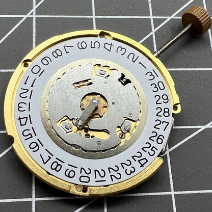 Swiss Made Ronda 6004D quartz watch movement with date window at 3 o?clock, precise timing accessory.