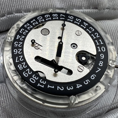 Swiss Made ETA C01.211 chronograph watch movement by 1853 with black dial and mechanical precision.