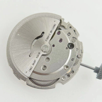 Miyota/Citizen 8215 watch movement with black dial, date at 6, automatic mechanical precision, Japan-made.