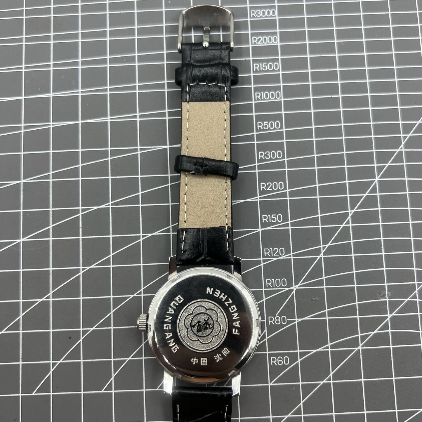 Baihua 37mm manual mechanical watch with silver dial, 19 jewels, shock-resistant for lasting performance.