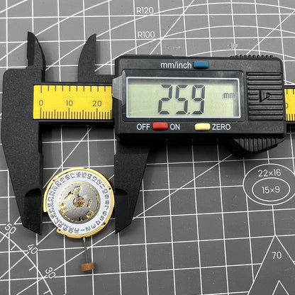 Swiss Made Ronda 6004D quartz watch movement with date display at 3 o?clock, precision timing accessory.