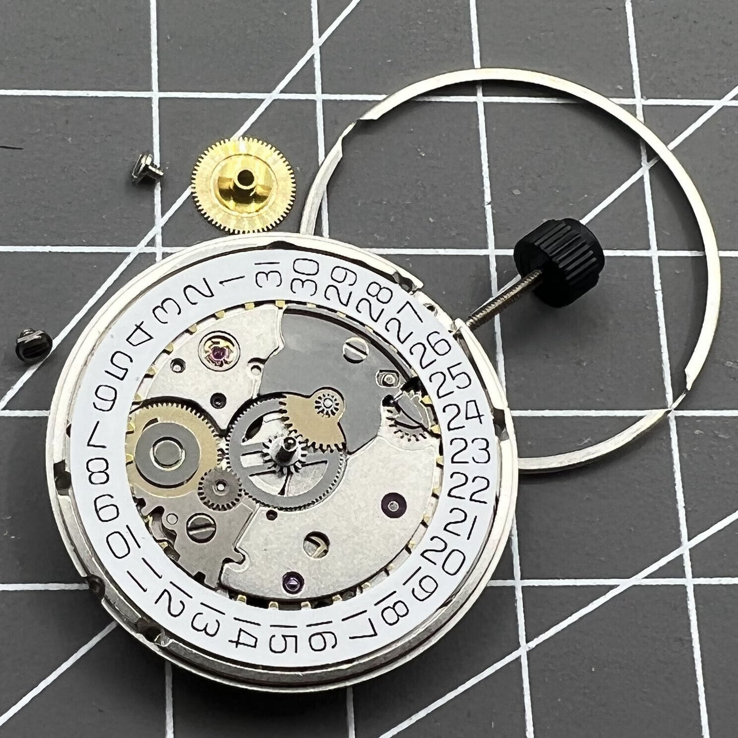 Original Silver SW200-1 automatic watch movement by ETA, precise mechanical replacement part for watches.