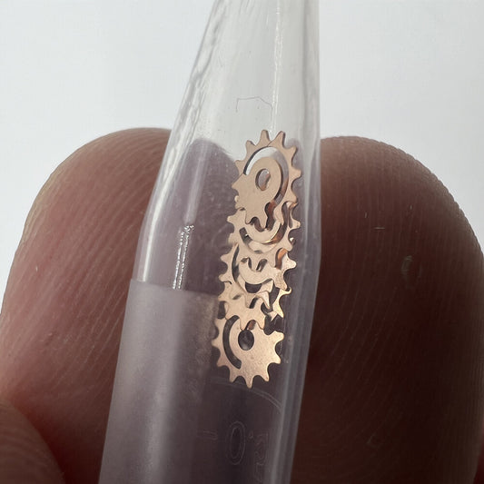 Date indicator driving wheels compatible with Ronda 705/715/515/505 movements for precise watch repair.