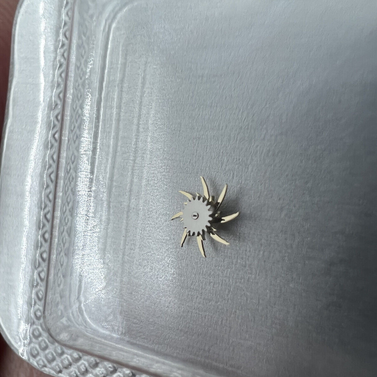 Precision Swiss Made Escape Wheel by Omega for 9900A 2500D watch movement repair, authentic Omega part.