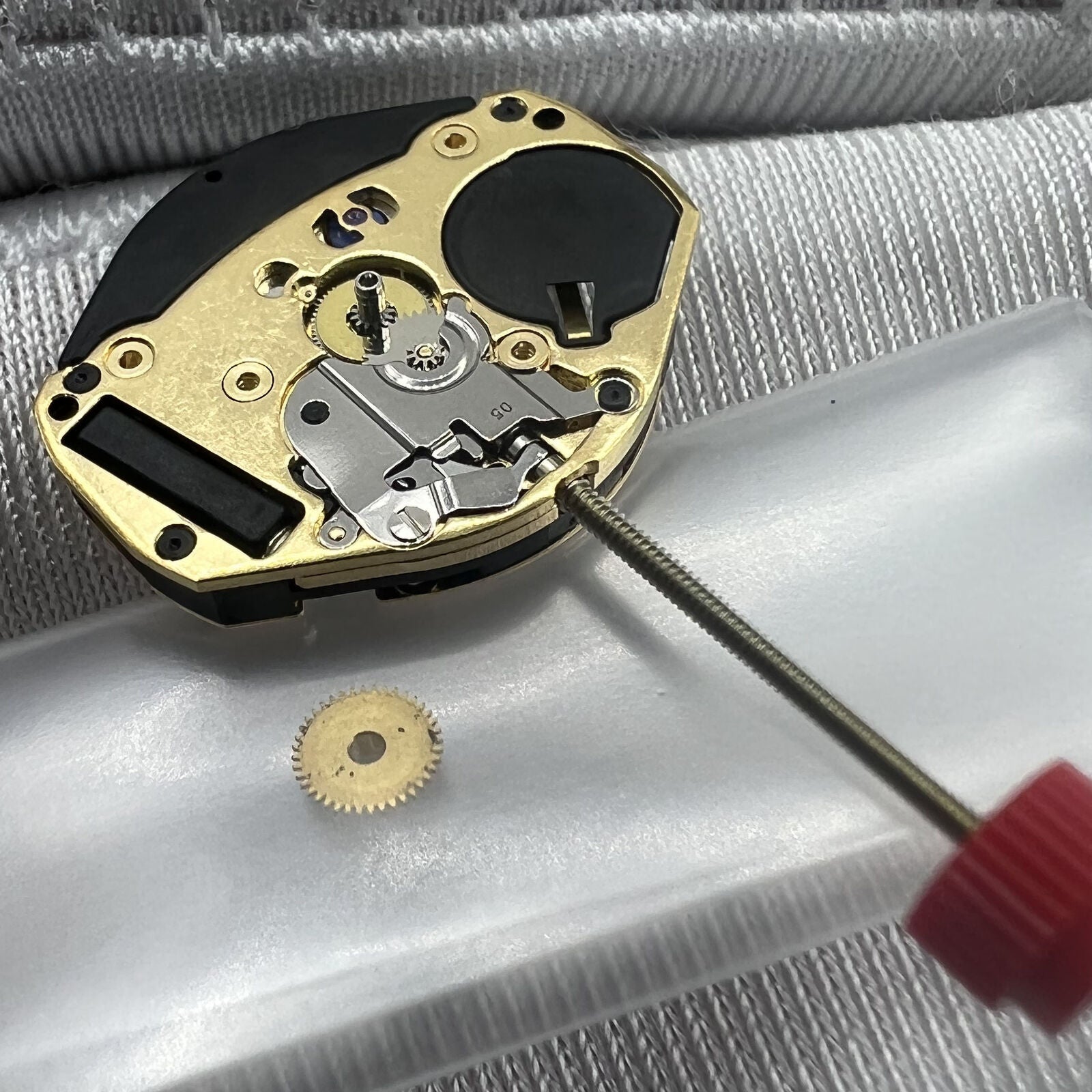 Swiss ETA 902.101 quartz watch movement with three hands, precise timekeeping by ETA.