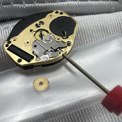 Swiss ETA 902.101 quartz watch movement with three hands, precise timekeeping by ETA.