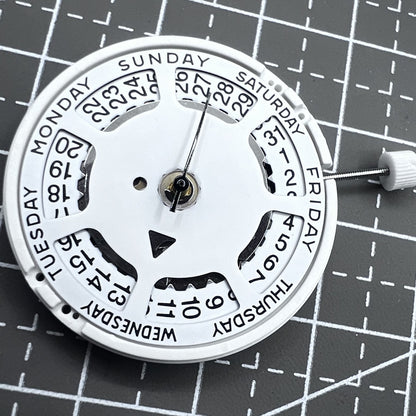Swiss ISA 1198 quartz watch movement with day and date function for precise timekeeping.