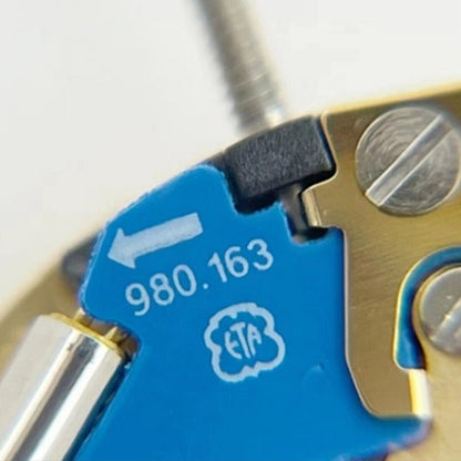 Swiss Made ETA 980.163 quartz 2-hand watch movement for precise timekeeping and repair parts.