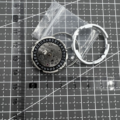 Miyota/Citizen 8215 automatic watch with black dial, date at 3, precise mechanical movement.