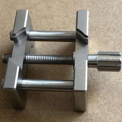 Stainless Steel Universal Watch Movement Holder, ideal for precise watch repair tasks.