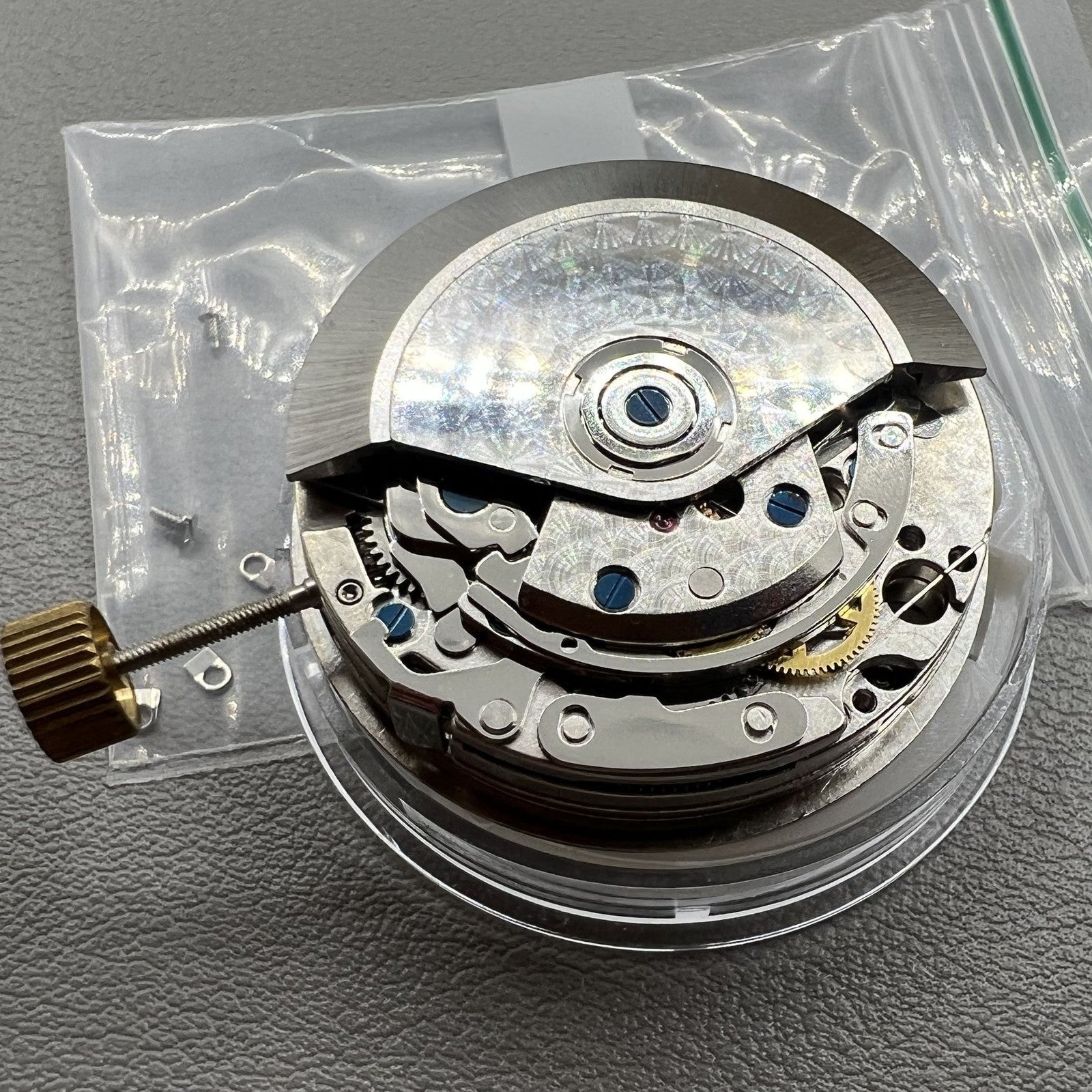 Chronograph watch accessory with ETA 7750 movement, white dial, single calendar at 6 o'clock, and sub-second hand at 9.