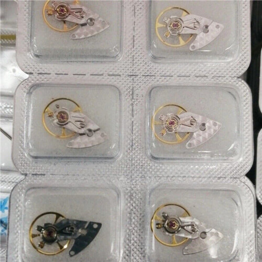 Silver carved watch balance wheel with splint for ETA2892 movement, precision China-made component for watch repair.