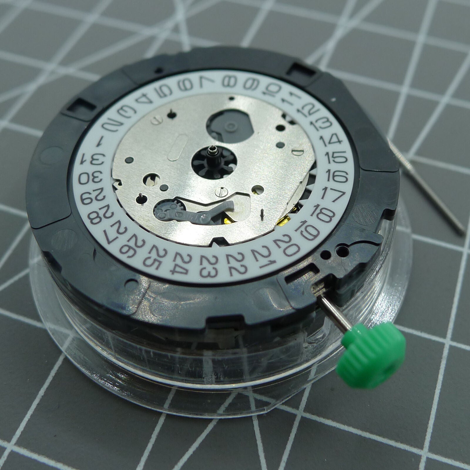 Japan Made Miyota OS20 quartz watch movement with date at 4.5, perfect for precise watchmaker repairs.