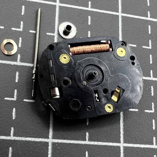 Hattori VX01 quartz watch movement with three hands, precision timekeeping for watch repair.